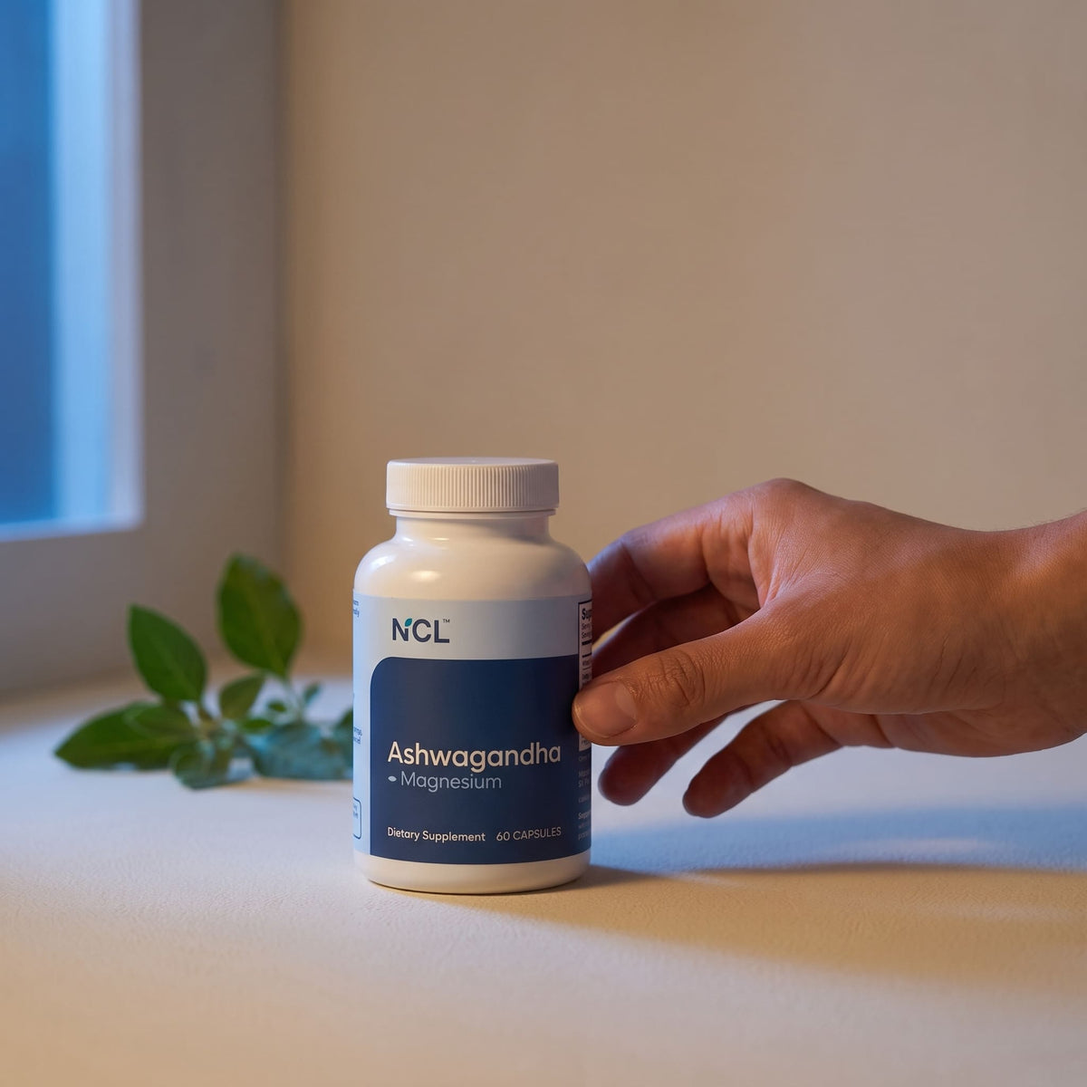 Hand reaching Premium KSM-66 Ashwagandha with Magnesium