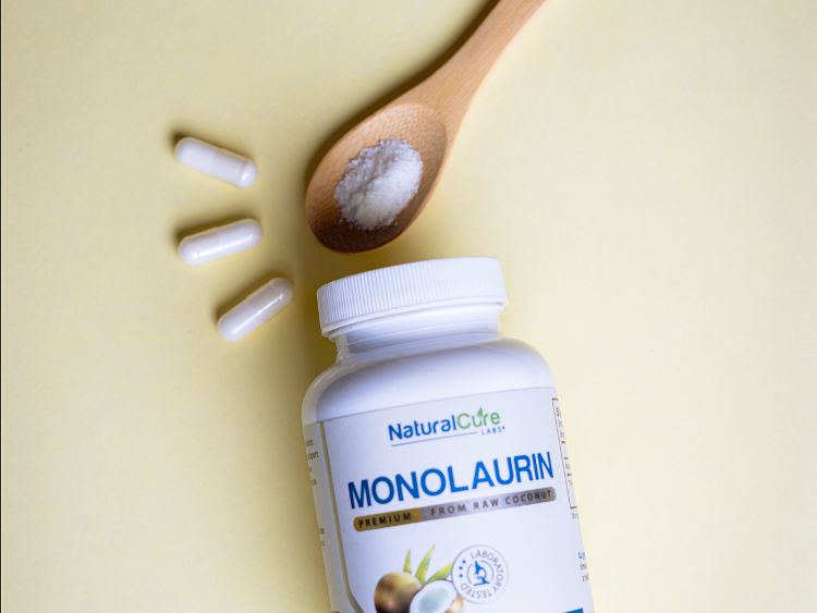 Monolaurin flatlay with capsules and powder
